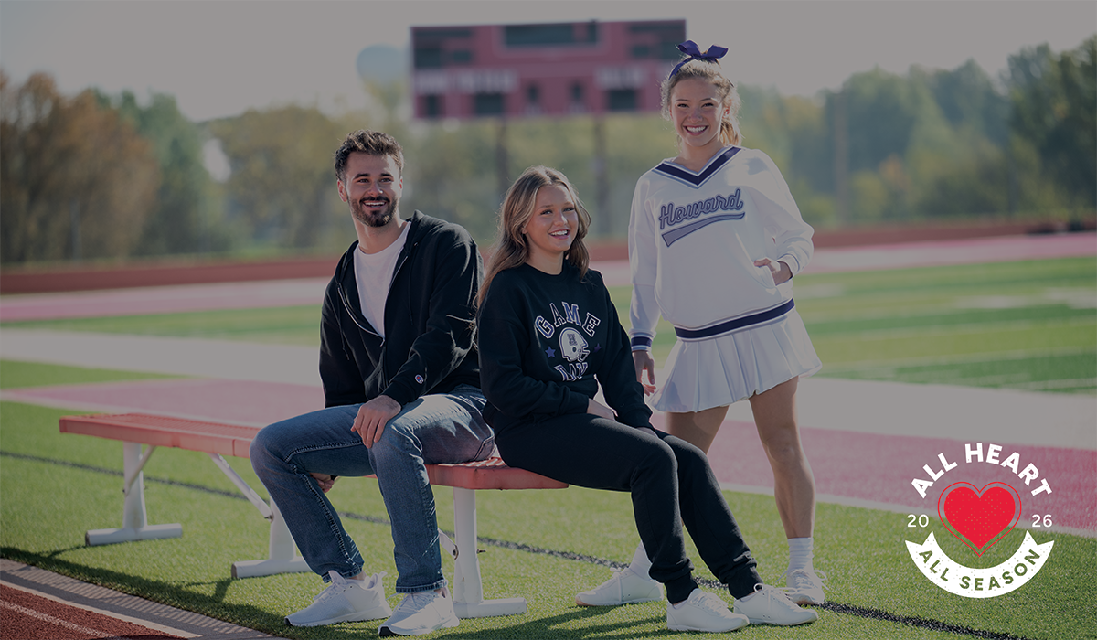 Female Wearing Champion Fleece and carrying fanny pack