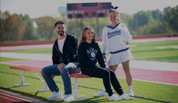 Cheerleader wearing Champion Fleece