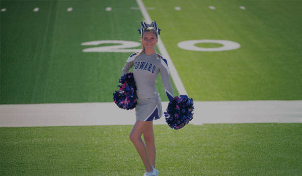 Cheerleader wearing Champion Cheer Custom Uniforms