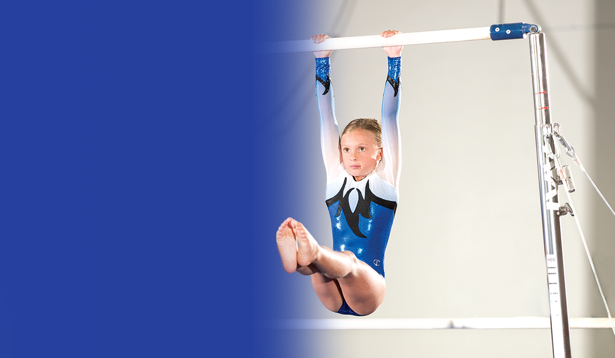 Girl on parallel bars wearing Champion Made Gymnastics Acro/Tumble Leotard