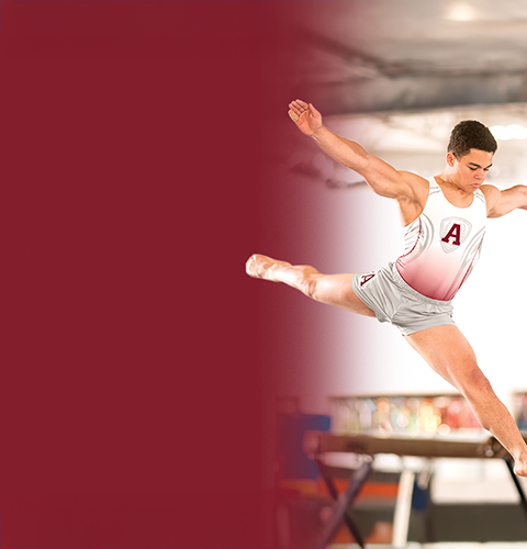 Male Gymnast in motion wearing Champion competition singlets and bottoms