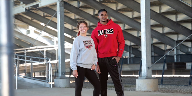 Female and male wearing Champion outerwear