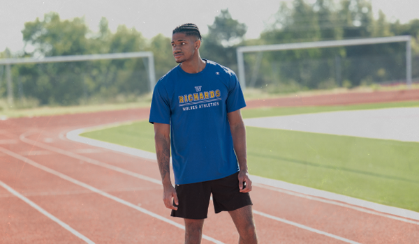 Male wearing Champion top