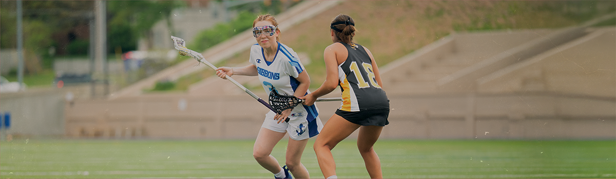 Male wearing Champion Lacrosse Uniforms