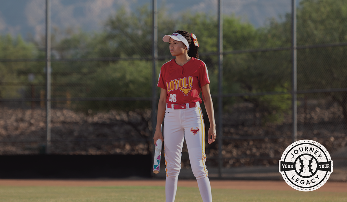 Softball player wearing Champion softball uniform