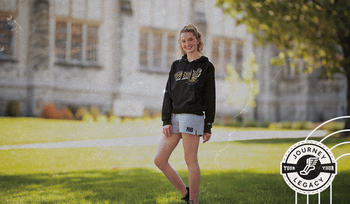 Female Wearing Champion Track Fan Gear