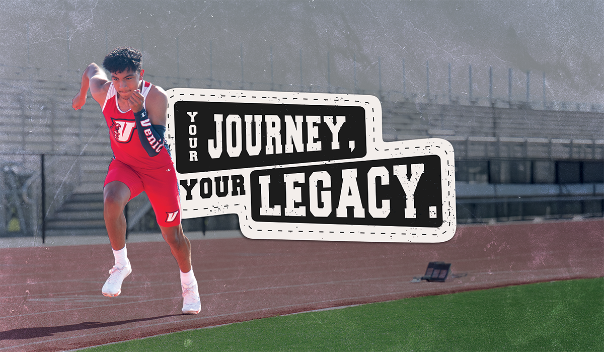 Athlete performing backward high jump wearing Champion Track Uniform