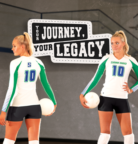 Female Volleyball Player Defending Ball Wearing Champion Volleyball Uniform