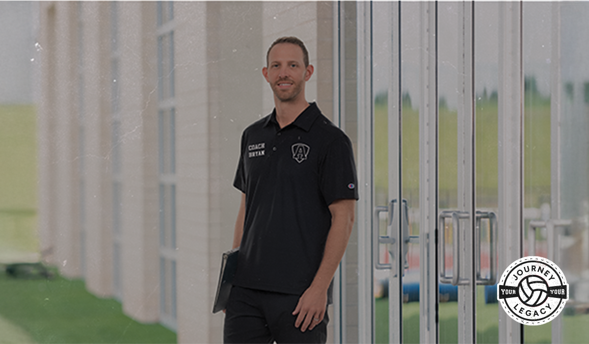 Male Holding Clipboard Wearing Champion Volleyball Coach's Gear