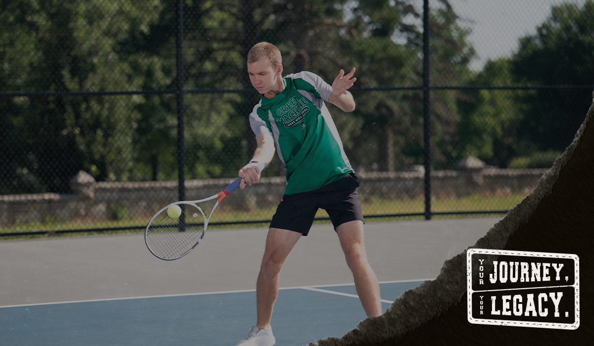 Male player wearing Champion Tennis apparel