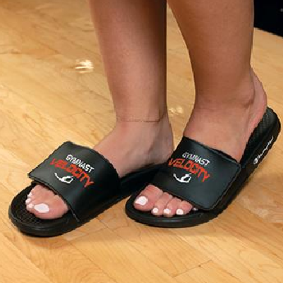 Female feet wearing Champion Slides